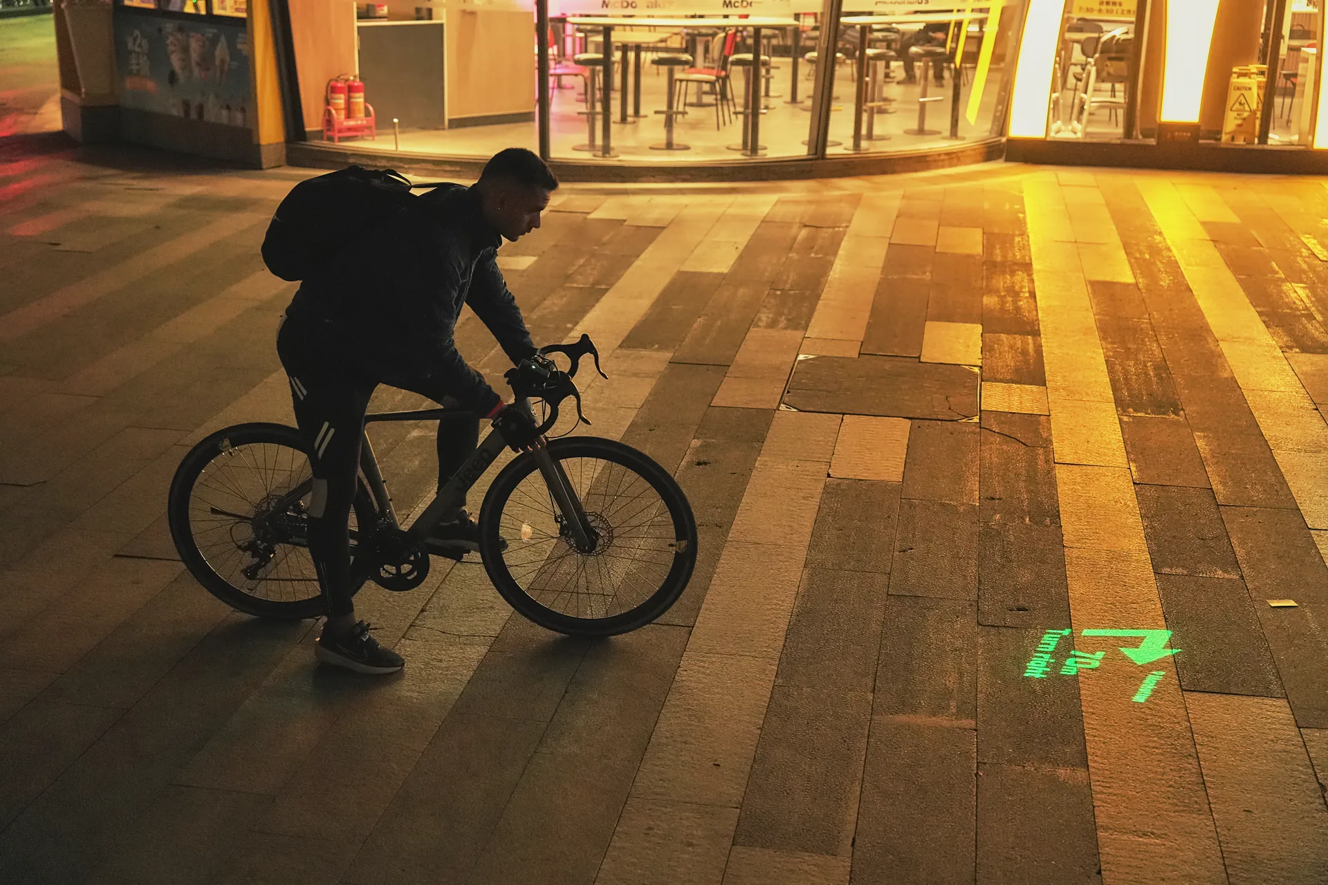 Night rider using road projection