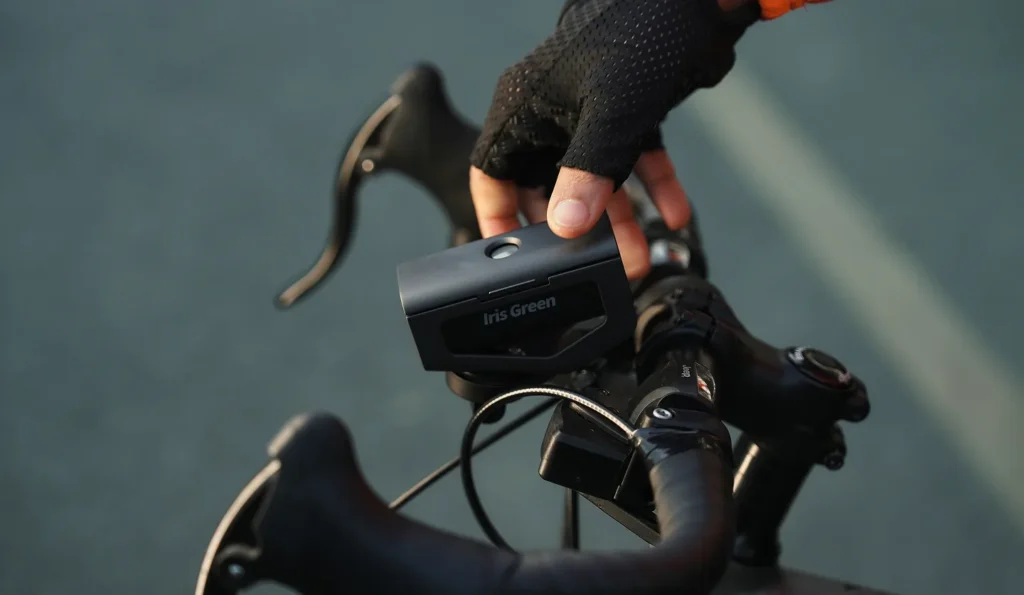 IRIS Green projecting visible content during a night ride